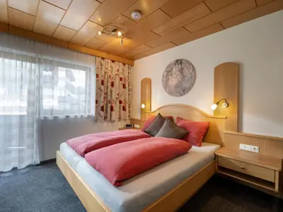 Ein Bett oder Betten in einem Zimmer der Unterkunft Haus Daniela