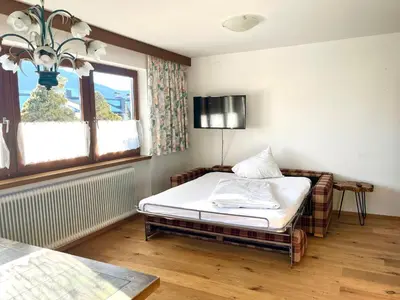Ein Bett oder Betten in einem Zimmer der Unterkunft Pension Hohe Salve