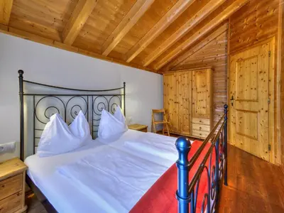 Ein Bett oder Betten in einem Zimmer der Unterkunft Feriendorf Wildschönau in Kitzbühel Alps