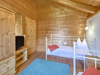 Ein Bett oder Betten in einem Zimmer der Unterkunft Feriendorf Wildschönau-Near ski area