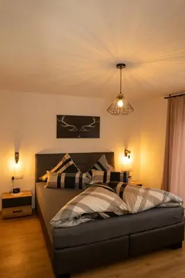 Ein Bett oder Betten in einem Zimmer der Unterkunft Appartement Hippach im Haus Sporer