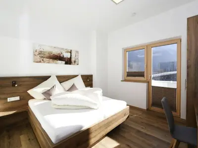 Ein Bett oder Betten in einem Zimmer der Unterkunft Holiday Home in Aschau by Zillertal Alps