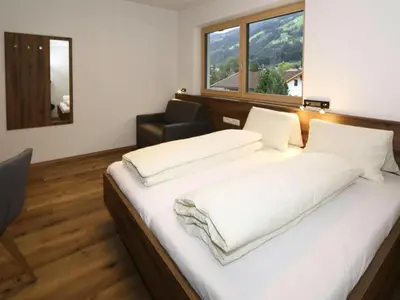 Ein Bett oder Betten in einem Zimmer der Unterkunft Holiday Home in Aschau by Zillertal Alps