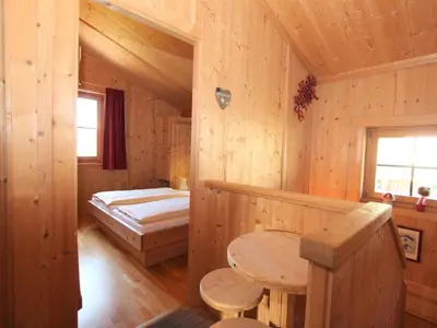 Ein Bett oder Betten in einem Zimmer der Unterkunft Holiday Home Schwendau-3 by Interhome