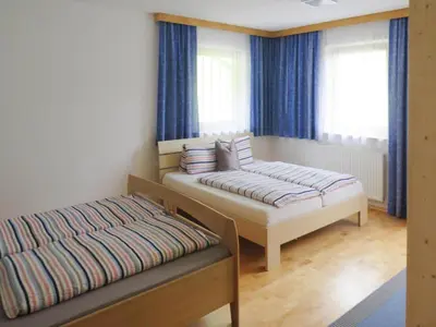 Ein Bett oder Betten in einem Zimmer der Unterkunft holiday home Emberger, Fügen