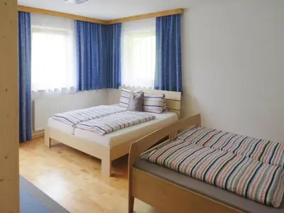 Ein Bett oder Betten in einem Zimmer der Unterkunft holiday home Emberger, Fügen