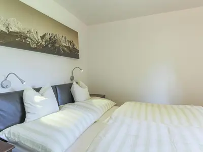 Ein Bett oder Betten in einem Zimmer der Unterkunft Chalet Jöchl