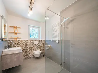 Ein Badezimmer in der Unterkunft Tirola Bude