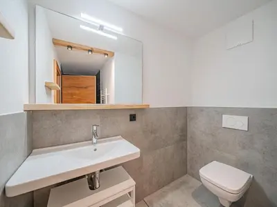 Ein Badezimmer in der Unterkunft Penningberg Top 1