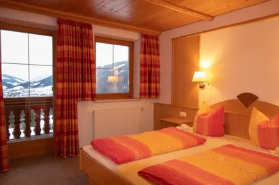 Ein Bett oder Betten in einem Zimmer der Unterkunft Ferienhaus Schatzberg Panorama WILD447