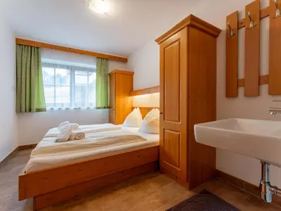 Ein Bett oder Betten in einem Zimmer der Unterkunft Löhnersbach